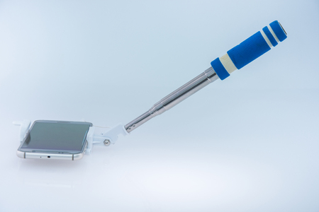 Selfie stick with mobile phoneの写真素材