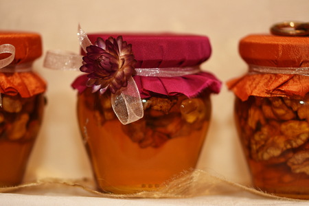 Jar of honey with walnutsの写真素材