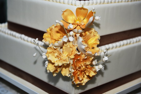 Beautiful wedding cake decorated with flowersの写真素材