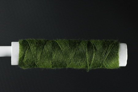 Green sewing threadの写真素材