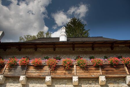 Moldovita Monastery, Romania,September 2017,geranium on the balconyのeditorial素材