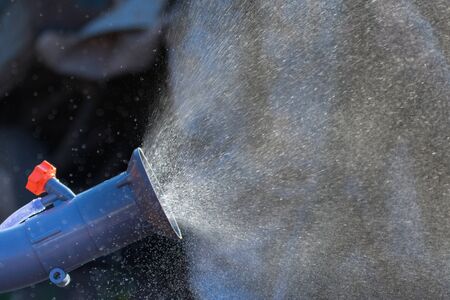 Water splash from automizer,Agricultural atomizer spraying pesticidesのeditorial素材