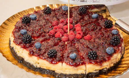 tart with raspberries, blueberries and blackberriesの写真素材