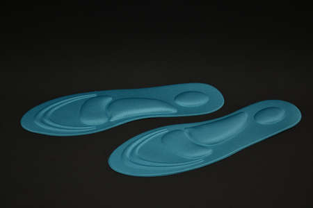 Memory Foam  Shoe Insoles on a black backgroundの写真素材