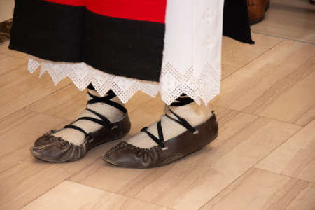Opinci traditional shoes and folk costume from Romania, Maramures, Barsana,