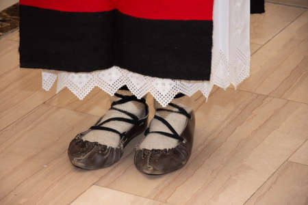 Opinci traditional shoes and folk costume from Romania, Maramures, Barsana,