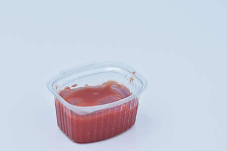 spicy tomato sauce in a transparent casserole
