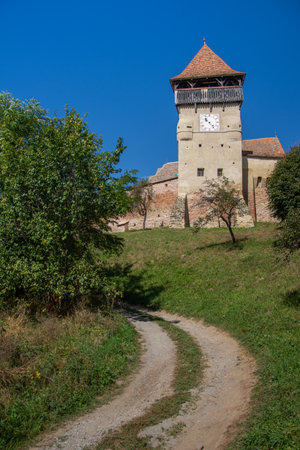Fortified church from Alma Vii village, MoÈna commune, Sibiu county, September 2020,The clock towerの写真素材