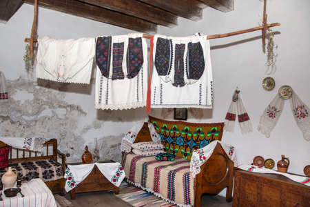 ROMANIA , Corvin Castle, Hunyadi Castle ,july,2021,Hunedoara, Transylvania,the castle room decorated with popular objectsのeditorial素材