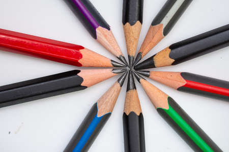 nine sharp pencils on a white background
