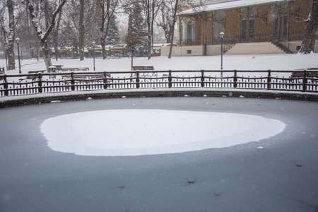 Frozen lake in the city park in December 2021, Bistrita, Romaniaのeditorial素材