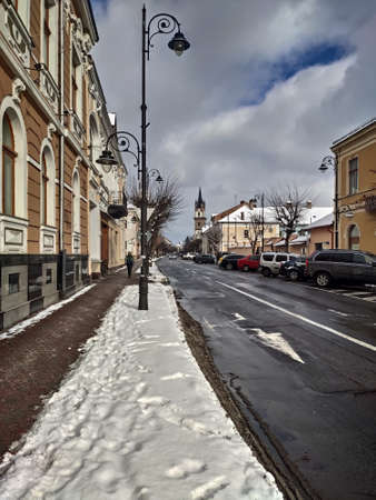entrance on Gheorghe Sincai Street, Bistrita, in February 2022, Romaniaのeditorial素材