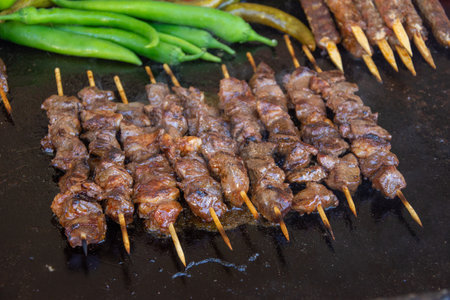 Roasting Frigarui ,skewers,on an outdoors grillの写真素材