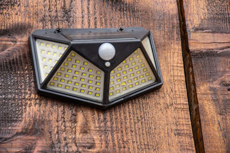 Solar LED Wall Lamp with Motion Sensor, 3 Lighting Modesの写真素材