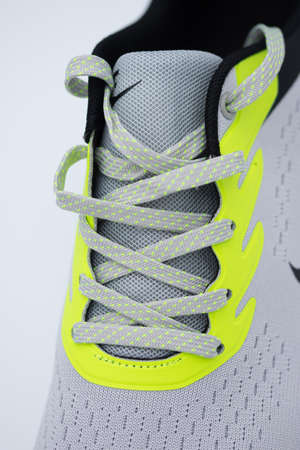 new green sneakers and the type of lace binding