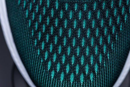 green sneakers sport shoe, stitching detail on sport shoes, lacesの写真素材
