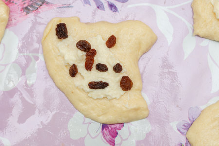 dough with cow's cheese and raisinsの写真素材