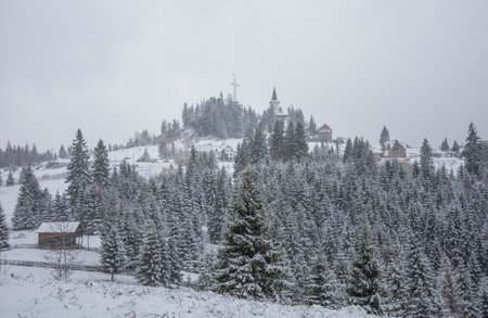 Winter landscape at Piatra FÃ¢ntÃ¢nele Monastery in Tihuta, BISTRITA, Romania,  2022のeditorial素材