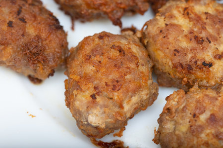 meatballs,chiftele, on a  white plate from Romania, Bistrita