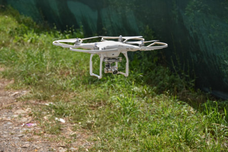 A white drone prepared for filming