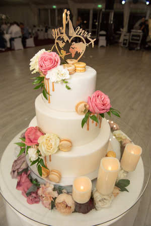 Mr  Mrs cake decoration sign on wedding cake