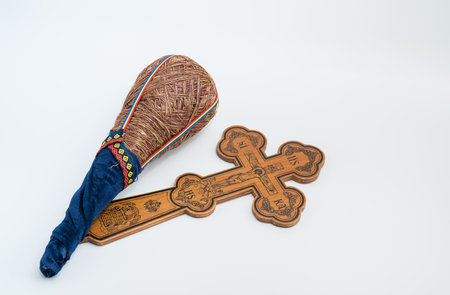 old  wooden Crucifix and  Sfestoc , used in the Orthodox church in Romania for blessing and protectionの写真素材