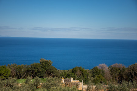 A wooden gate to the Aegean Sea, near Prodromou Skete on Mt. Athos, Greece, February, 2023の写真素材