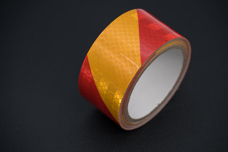 High-Visibility Reflective Tape - Waterproof, Durable PVC, Red & Yellow Hazard Warning Caution Tape with Strong Adhesive for Vehicles, Trailers, Boats, Signs - Outdoor Safety Conspの写真素材