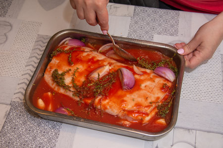 Pork prepared in tomato sauce with red onion, amazing foodの写真素材