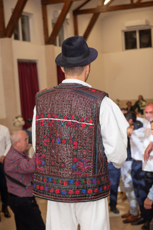 Traditional leather outfit decorated with flowers ,Maramures area, Romania, 2024