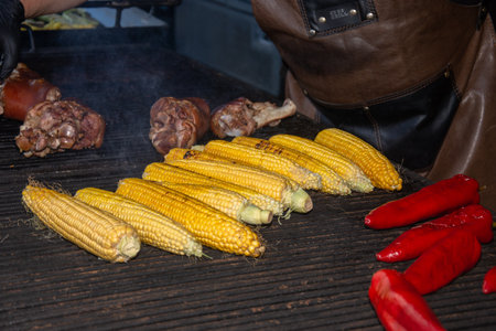 Grilled peppers, corn and porkの写真素材