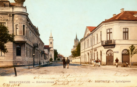 vintage postcard depicting Hospital Street cu Casa Textoris ,Posta Veche in BistriÈa , Romania, around 1906のeditorial素材