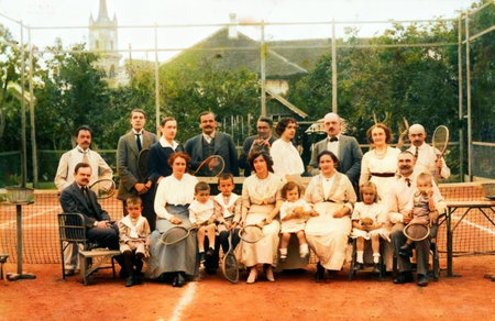 An old photograph from 1914 depicts members of high society in BistriÈa, Romania, gathered at a tennis court.のeditorial素材