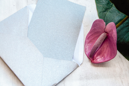 romantic background: blank paper with flower anthuriumの写真素材