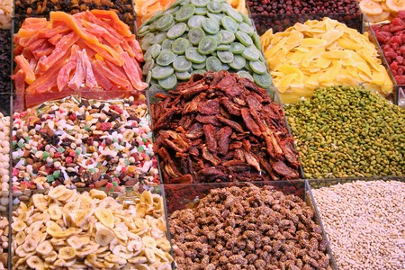 dried fruits assortment in boqueria market at barcelona