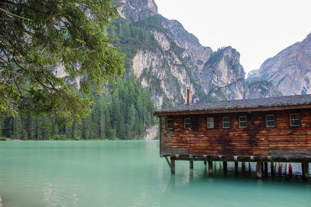 The emerlad water of lake of Braies in Alto Adige, Italyの写真素材