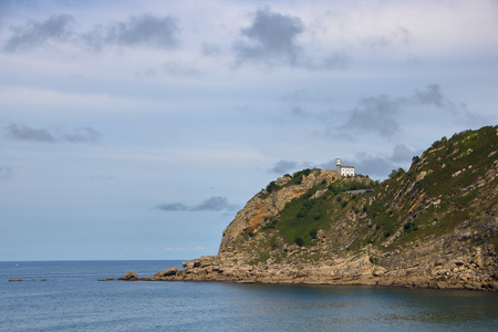  The lighthouse of Getaria from Zarautz beach and landscape of basque coast, Spainの写真素材