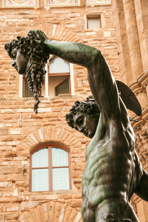perseo with medusa head, a bronze sculpture by Benvenuto Cellini in the Loggia dei Lanzi, Piazza della signoria, Florence, Italy のeditorial素材
