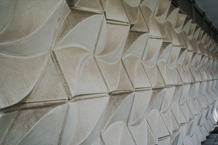 detail of the pattern on a white wall of a facade in modern Berlin