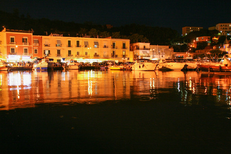 AT BAIA - POZZUOLI - NAPLES - ITALY ON 09/25/2016 - The little old port of Baia in Naples province, at night. Italyのeditorial素材