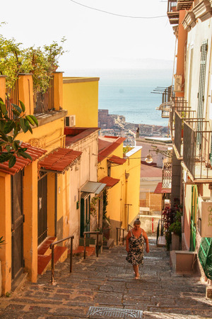 AT NAPLES - ITALY -  ON 09/25/2016 - Woman climbing Petraio stairs, old staircase leading to Vomero hill, Naples, Italyのeditorial素材