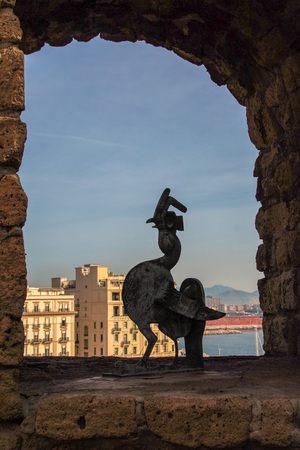 the port of Naples framed by the old wall of Castel dell'Ovo, Naples, Italyの写真素材