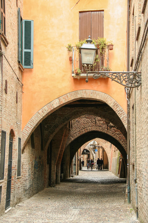 AT FERRARA - ITALY - The picturesque medieval Via delle Volte at Ferrara, Emilia Romagna, Italyの写真素材