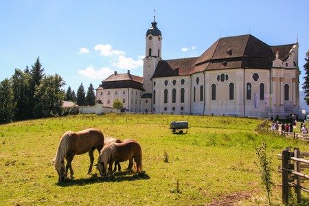 Pilgrimage Church of Wies - Wieskirche at Steingaden on the romantic road in Bavaria, Germanyの写真素材