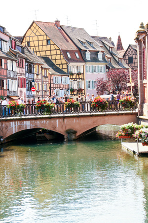 At Colmar - France - On 08/11/2016 - Colorful half-timbered  houses reflecting in canals in the historicql center of Colmar, Alsace.のeditorial素材