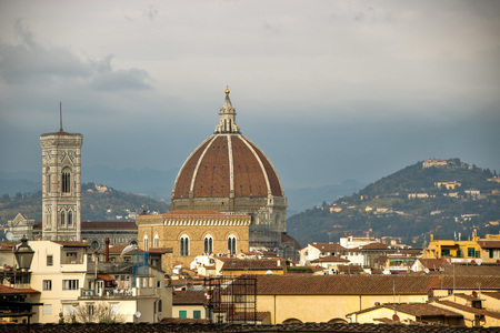The Dome of Florence Cathedral designed by Filippo Brunelleschi as seen from Uffizi Gallery, Florence, Italyの写真素材