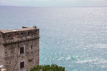 Old tower watching the sea at  Monterosso, one of the most scenic destinations in five lands,...