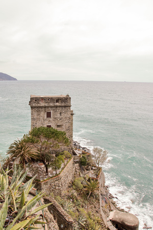 Old tower watching the sea at  Monterosso, one of the most scenic destinations in five lands, Ligury, Italyの写真素材