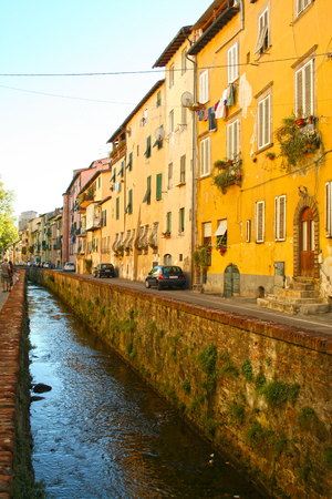 At Lucca -  Italy , On 08/27/2012 - via del fosso, an old street along the channelのeditorial素材