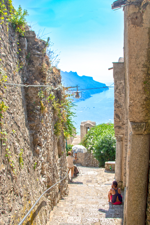 At Ravello - Italy - On august 2018 - A painter reproducing a lovely view of Ravello in Via dell'Annunziataのeditorial素材